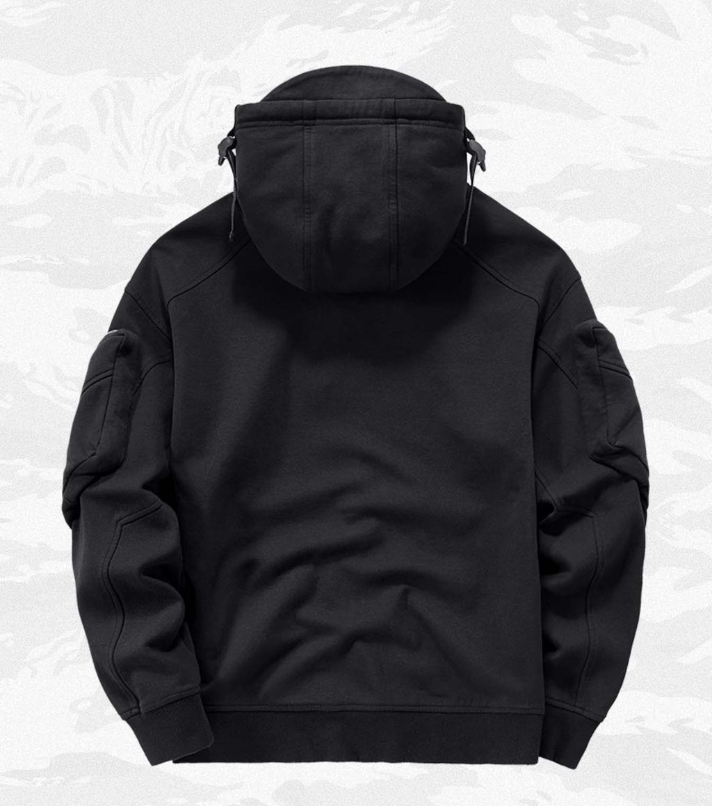 Niepce Menace Tech Hoodie in black, featuring a modern design with a front pocket and adjustable drawstrings.