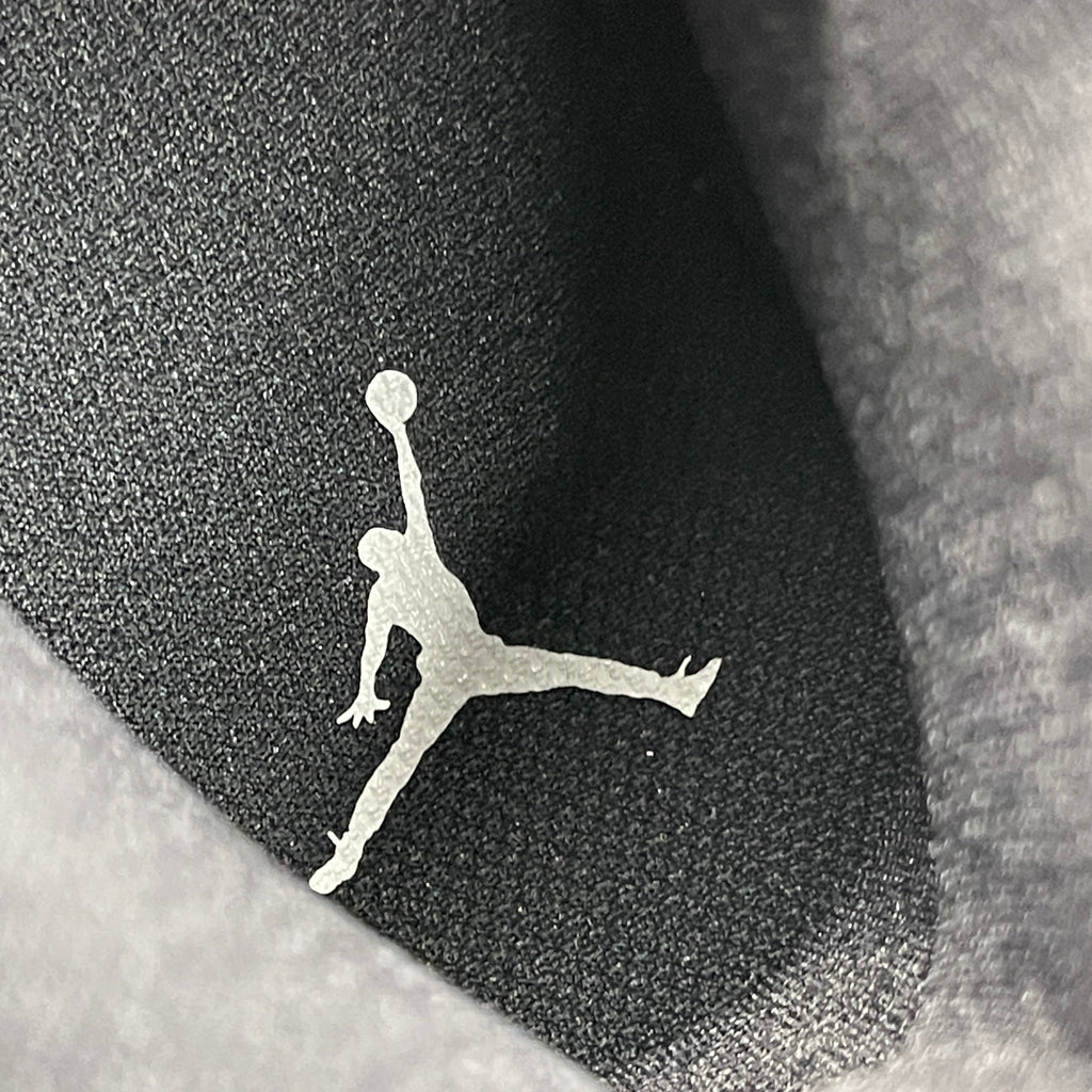 Nike Air Jordan 1 Mid Panda women's sneaker in black and white, size 6, featuring the iconic design and brand logo.