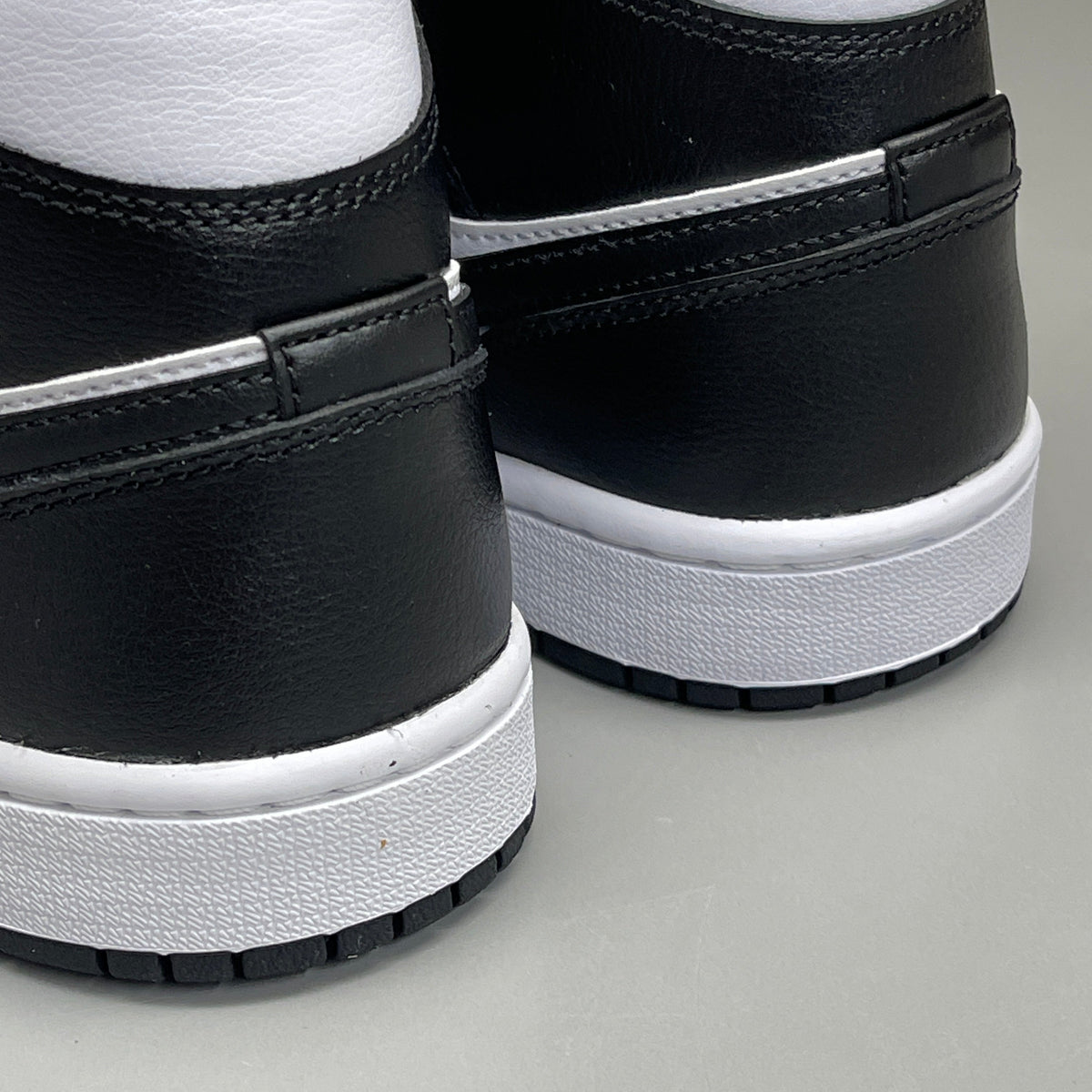 Nike Air Jordan 1 Mid Panda shoes for women, size 6, black and white colorway, featuring a classic sneaker design.