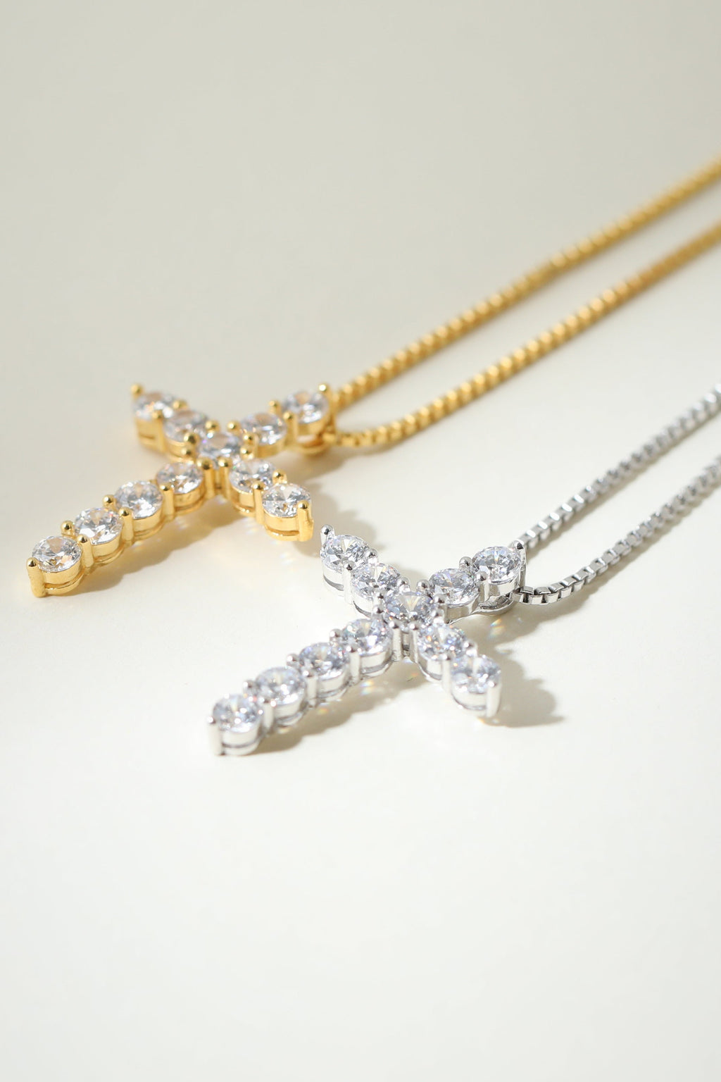 Gold Bella Pavé Cross Pendant by The M Jewelers featuring intricate pavé detailing and a religious cross design.