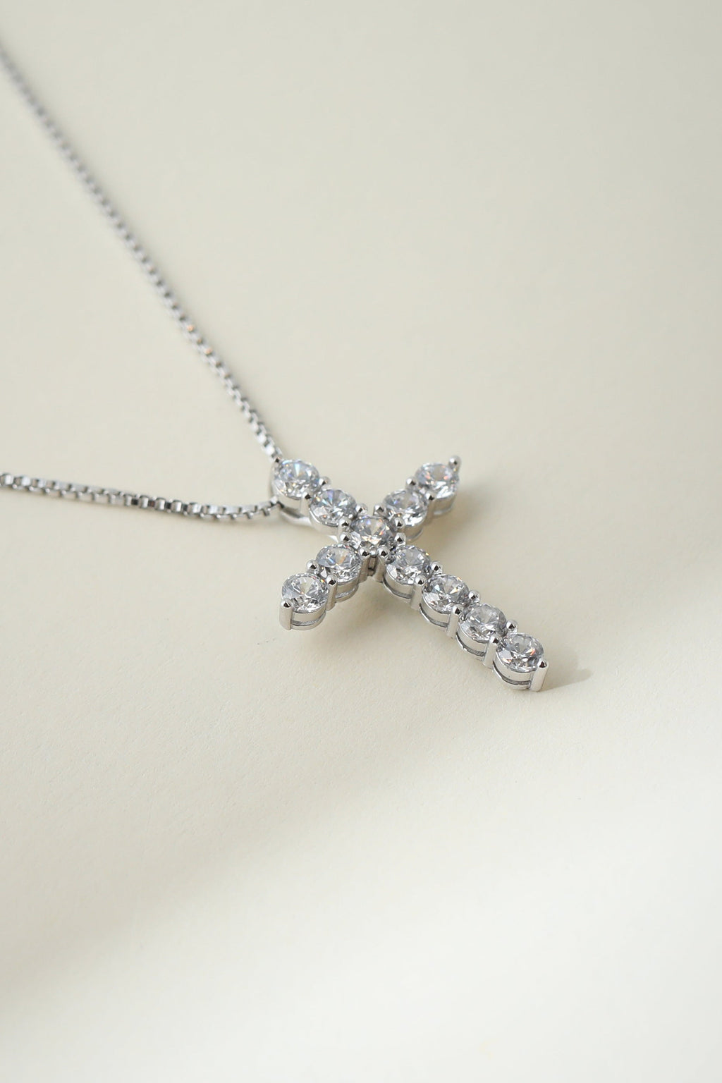 Silver Bella Pavé Cross Pendant with sparkling accents, religious jewelry piece by The M Jewelers featuring intricate design.
