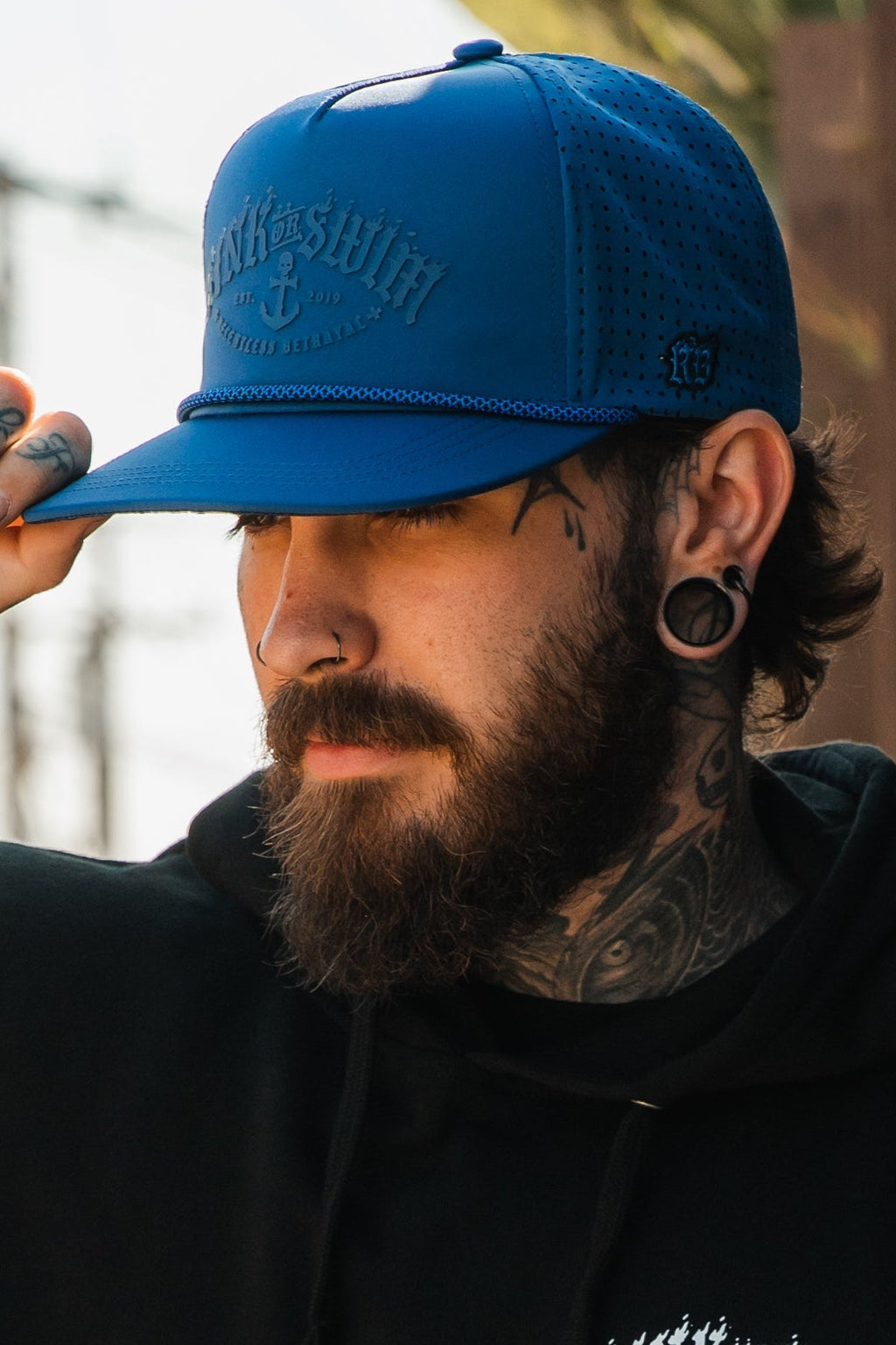 Dark Waters SOS Mute PVC snapback hat by Relentless Betrayal featuring a black adjustable cap with bold embroidered logo.