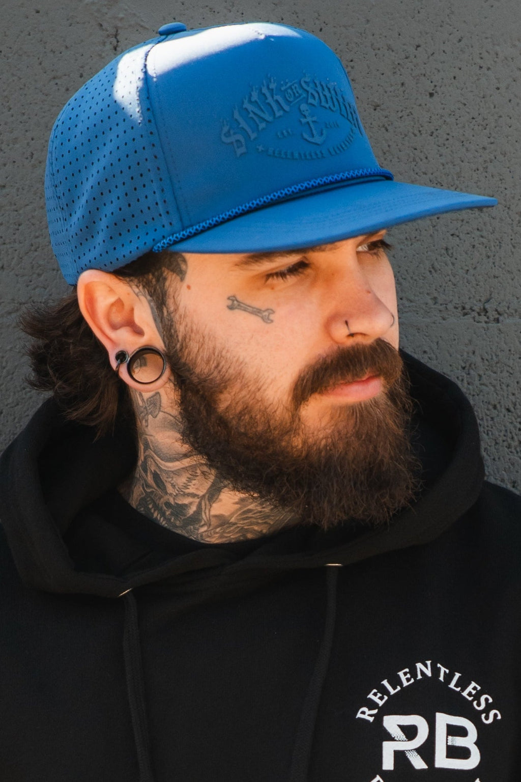 Relentless Betrayal Dark Waters SOS Mute PVC snapback hat with flat brim and adjustable strap, featuring a dark water-themed design.