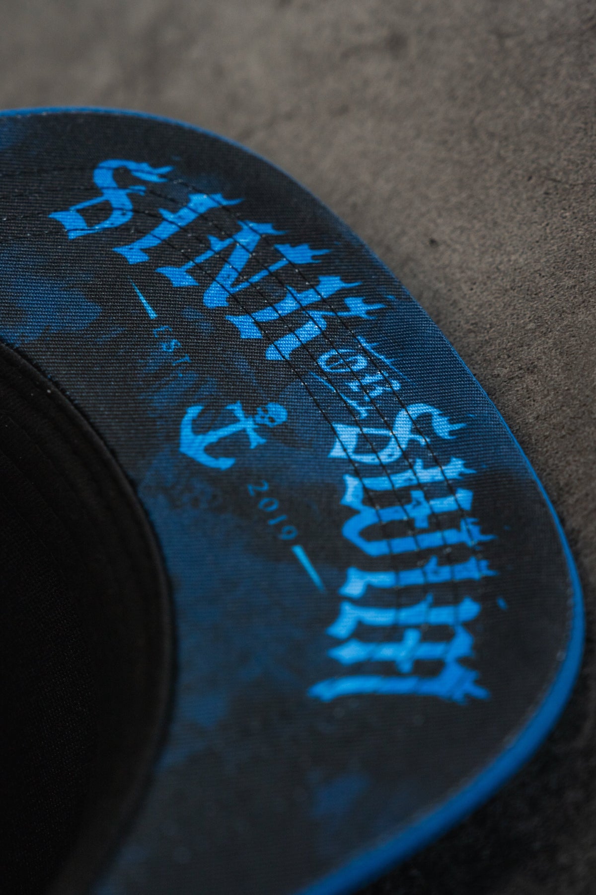 Relentless Betrayal Dark Waters SOS Mute PVC snapback hat with adjustable strap and bold logo design.