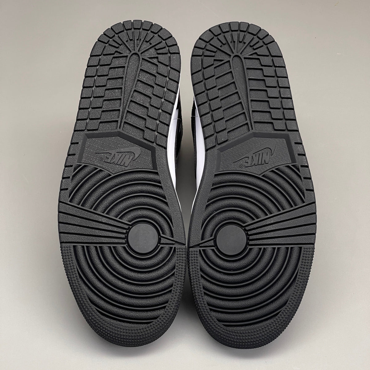 Nike Air Jordan 1 Mid Panda women's shoes in black and white with Nike branding, size 6, featuring a stylish sneaker design.