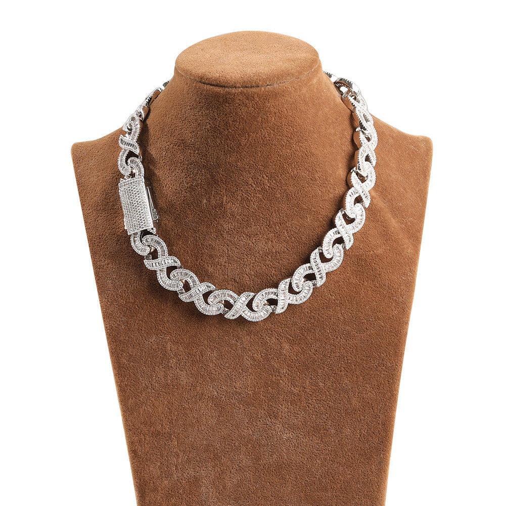 15mm diamond-cut geometric infinity Cuban chain by nowadaysfashion, showcasing shiny, interconnected links in a sleek jewelry design.