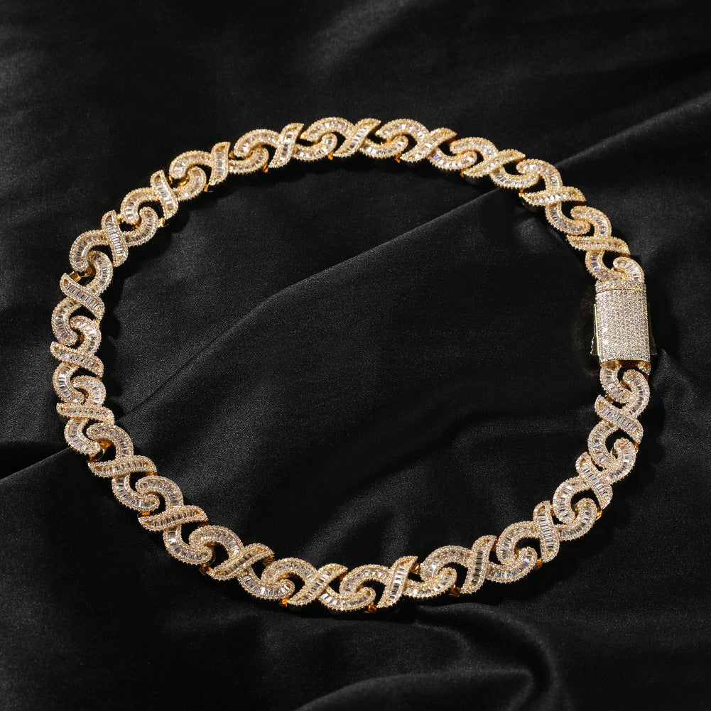 15mm diamond-cut geometric infinity Cuban chain from nowadaysfashion, showcasing shiny, interconnected links in a bold jewelry design.