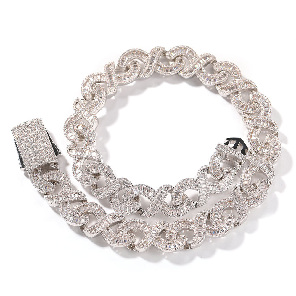 15mm diamond geometric infinity Cuban chain from nowadaysfashion, showcasing a shiny silver chain with intricate diamond-cut geometric links.