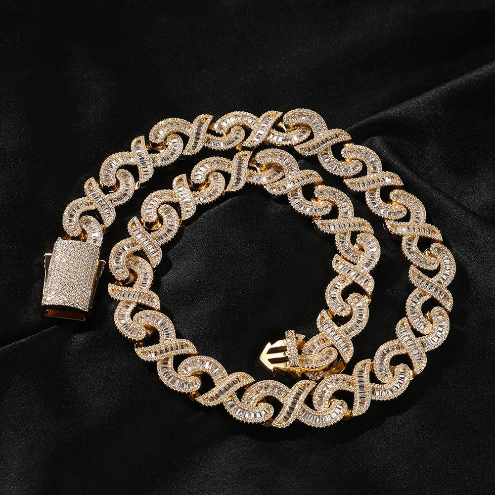 15mm diamond-cut geometric infinity Cuban chain from nowadaysfashion, featuring a polished, interconnected design in shiny metal.