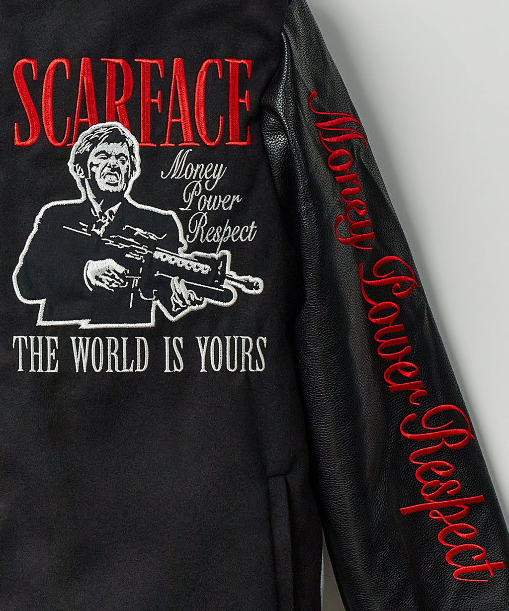 Reason Clothing Scarface vegan leather chenille patched varsity jacket with striped cuffs and collar, front embroidery, and patch details.