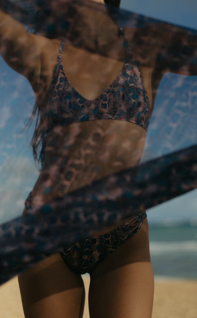 North Shore Brazilian bikini bottom by Forever Young Swimwear, featuring a sleek, minimal design with textured fabric and a low-rise fit.